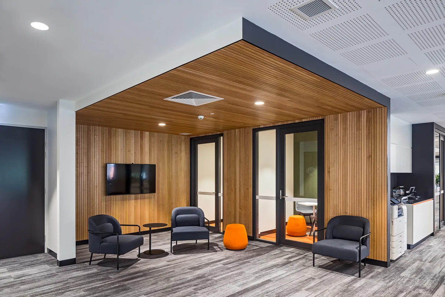 Meeting room with timber wall and ceiling panelling — West Tigers Centre of Excellence