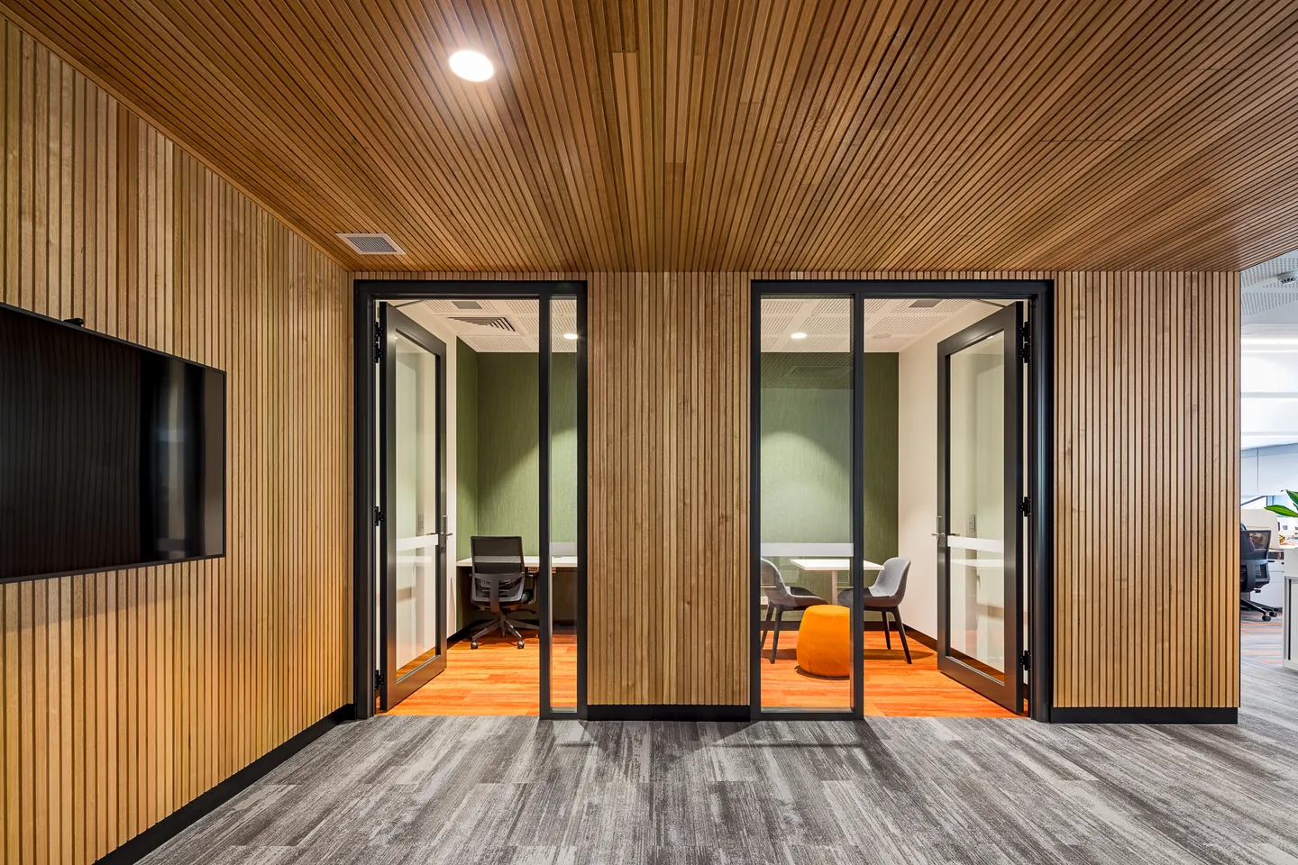 Timber-lined meeting room entrance — West Tigers Centre of Excellence